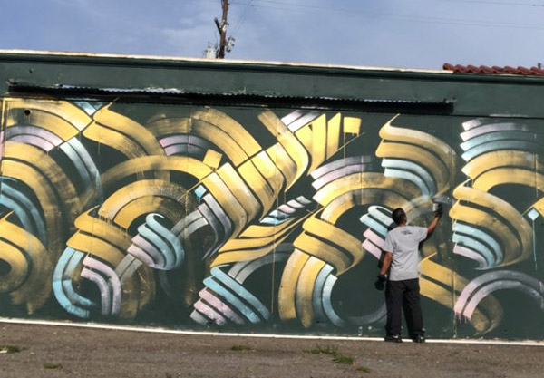 Blue Lot in Downtown Santa Ana Mural by Zak Perez