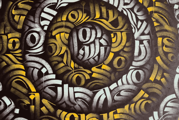 Calligraffiti mandala in yellow and turquoise at Progress on Main