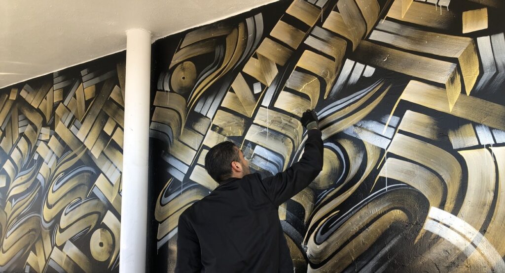 Zak Perez painting at Art Supply Warehouse