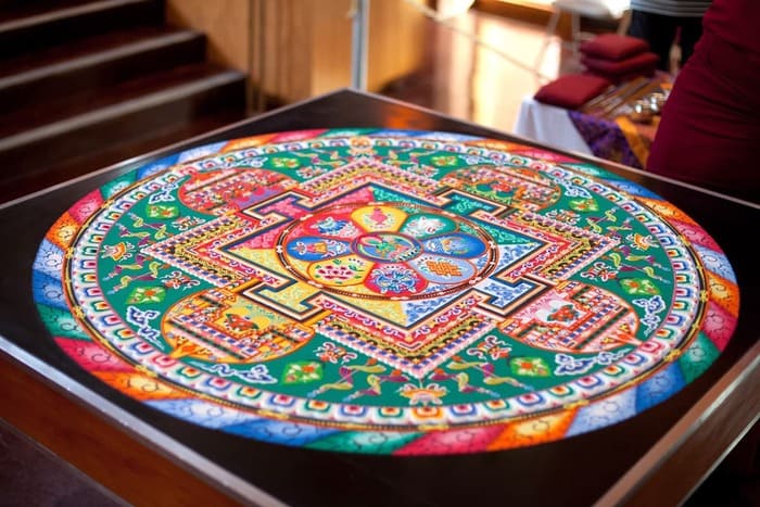 A full view of a completed Green Tara mandala, created by monks from Drepung Loseling at Agnes Scott College