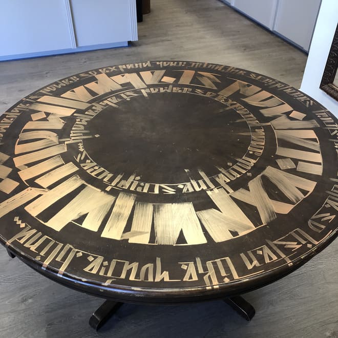 Mandala painted on a table with original poetry, by Zak Perez