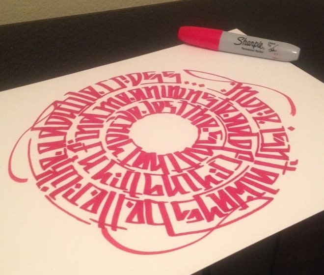 Red calligraffiti mandala created in red marker