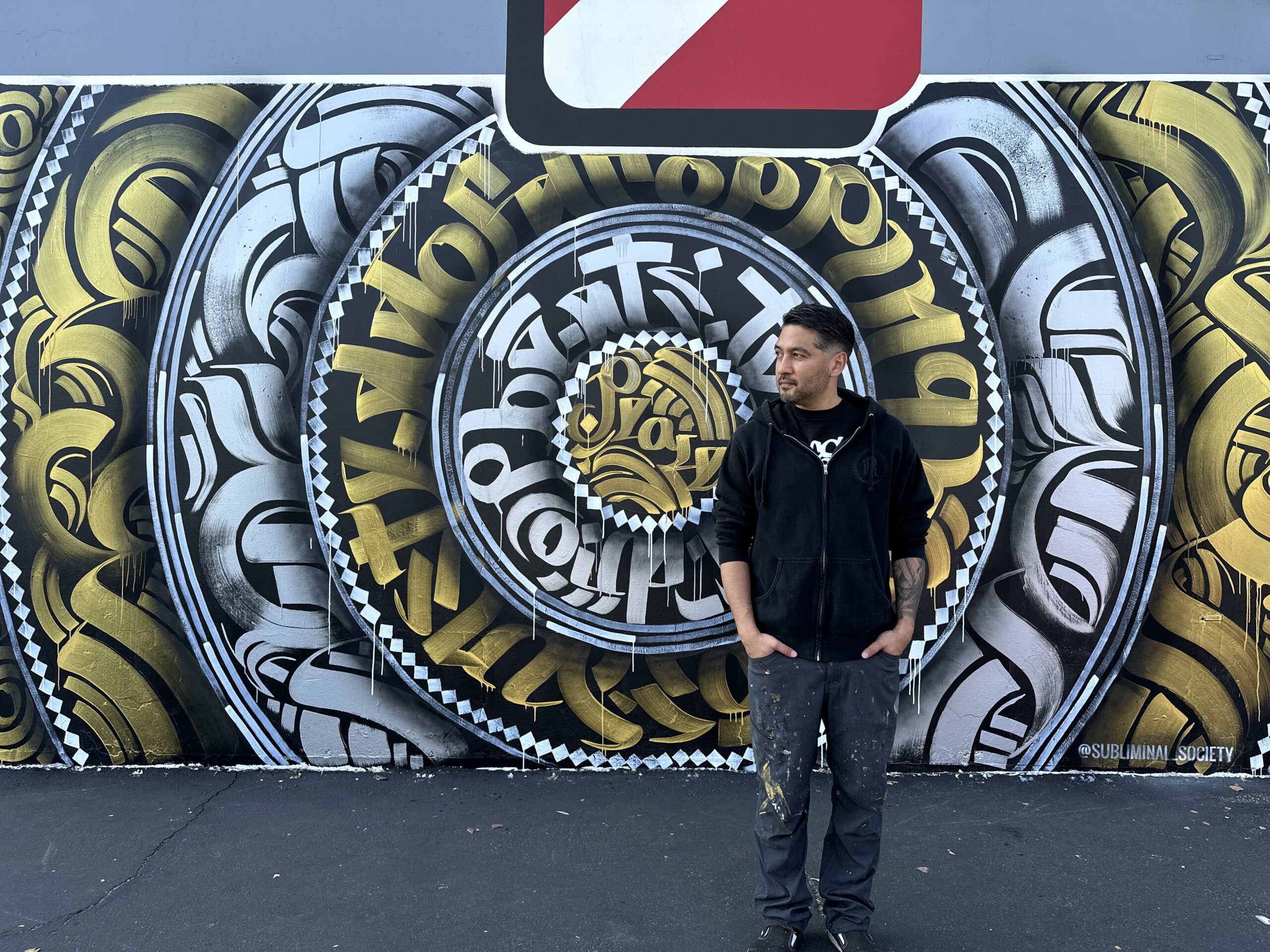 Calligraffiti mandala mural by Zak Perez at Art Supply Warehouse