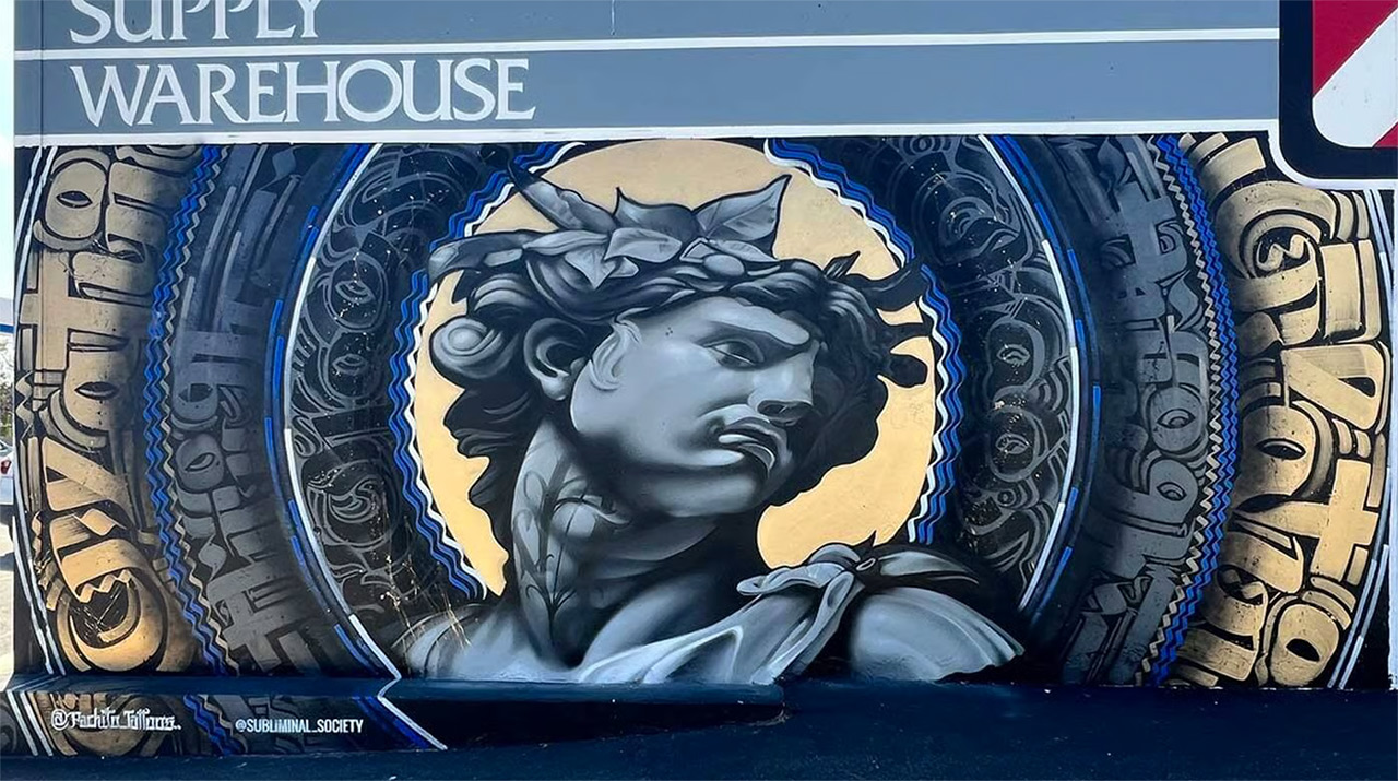 Mural with greko roman portrait and calligraphy background at Art Supply Warehouse