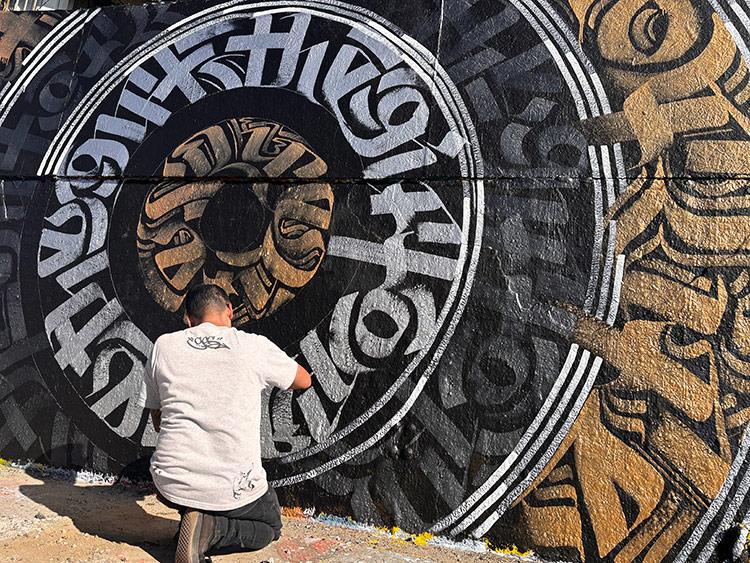 Zak Perez painting a live mural at The Graff Lab in LA